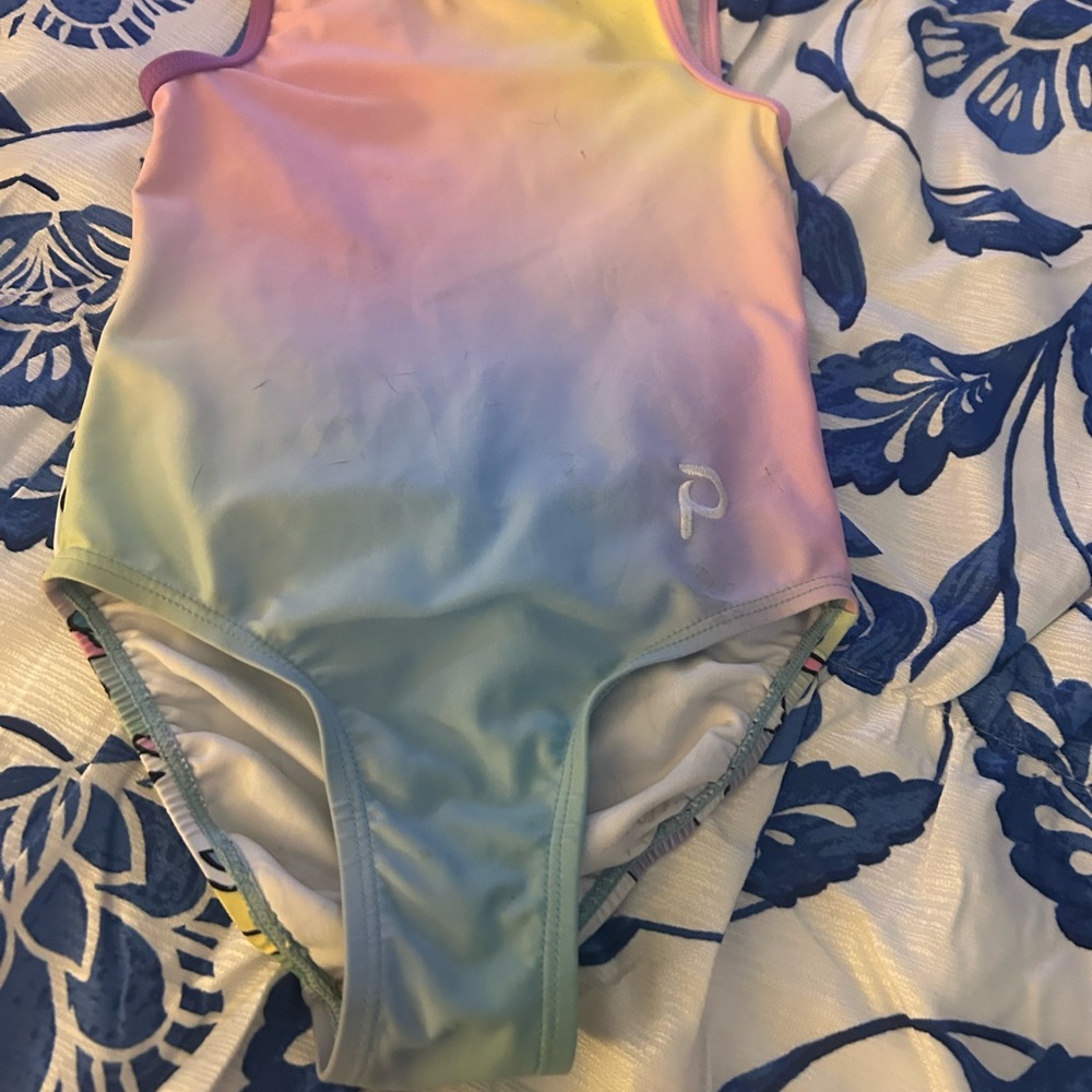 Plum gymnastics leotard.
